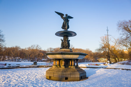 Fountain with an angel statue located in Central Park in New York City USA.のeditorial素材