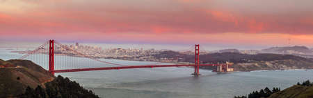 Golden Gate Bridge and downtown San Francisco at twilight