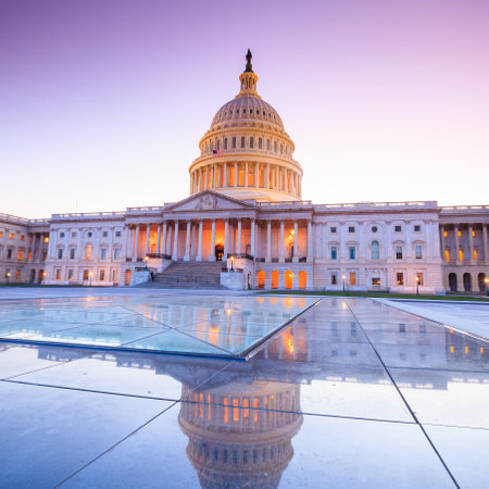 The United States Capitol building with the dome lit up at night. のeditorial素材