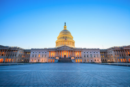 The United States Capitol building with the dome lit up at night. のeditorial素材