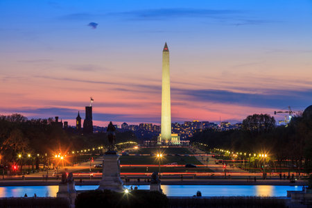 Washington DC city view at a orange sunset, including Washington Monument from Capitol buildingのeditorial素材