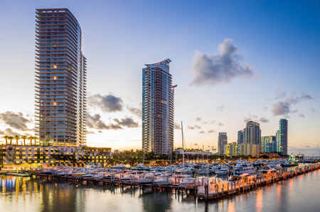 Miami south beach street view with water reflections at night and the marinaのeditorial素材