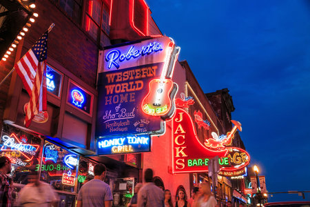 NASHVILLE - AUGUST 1: Neon signs on Lower Broadway Area on August 1, 2014 in Nashville, Tennessee, USAのeditorial素材