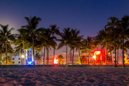 MIAMI - August 10 : Miami Beach, Florida hotels and restaurants at sunset on Ocean Drive on August 10, 2014. World famous destination for it's nightlife, beautiful weather and pristine beachesのeditorial素材