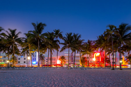 MIAMI - August 10 : Miami Beach, Florida hotels and restaurants at sunset on Ocean Drive on August 10, 2014. World famous destination for it's nightlife, beautiful weather and pristine beachesのeditorial素材