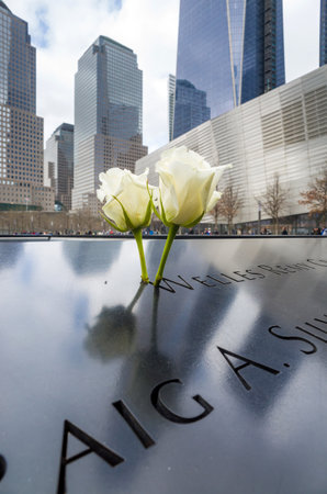 NEW YORK CITY - APRIL 10: NYC's 9/11 Memorial at World Trade Center Ground Zero seen on April 10, 2014. The memorial was dedicated on the 10th anniversary of the Sept. 11, 2001 attacks.のeditorial素材