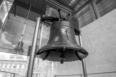 Liberty Bell  old symbol of American freedom  in Independence Mall building in Philadelphia Pennsylvania black and whiteの写真素材