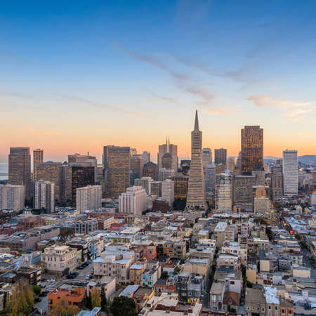 Beautiful view of  business center in downtown San Francisco at sunset.の写真素材