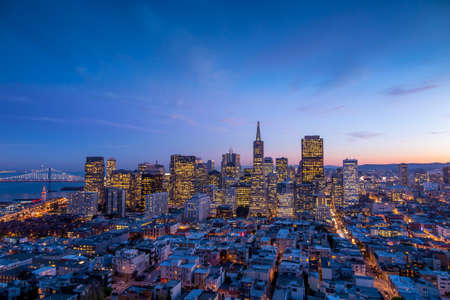 Beautiful view of  business center in downtown San Francisco at sunset.の写真素材