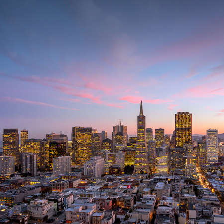 Beautiful view of  business center in downtown San Francisco at sunset.の写真素材
