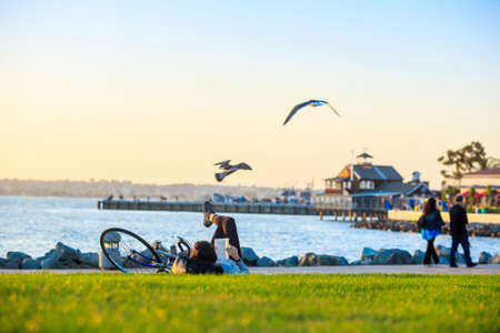 Sunset at San Diego Waterfront Public Park, Marina and the San Diego Skyline. California, United States.の写真素材