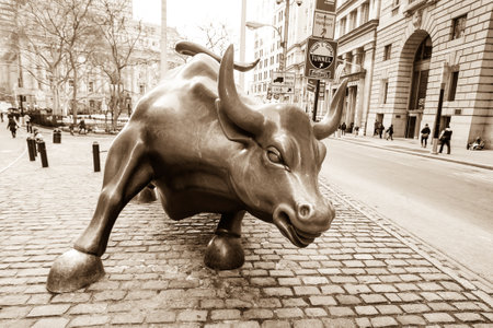NEW YORK CITY - FEB 11: The landmark Charging Bull in Manhattan represents aggressive financial optimism and prosperity on February 11, 2015. in New York City.のeditorial素材