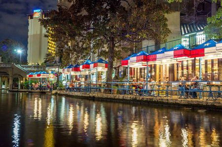 SAN ANTONIO, TEXAS, USA - SEP 28: Section of the famous Riverwalk on September 28, 2014 in San Antonio, Texas. A bustling place with many restaurants and bars.のeditorial素材