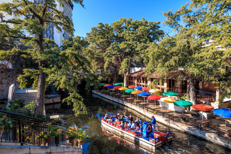 SAN ANTONIO, TEXAS, USA - SEP 27: Section of the famous Riverwalk on September 27, 2014 in San Antonio, Texas. A bustling place with many restaurants and bars.のeditorial素材