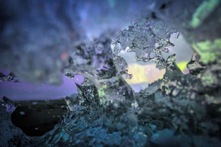 Auroral display over the glacier lagoon Jokulsarlon in Iceland.の写真素材