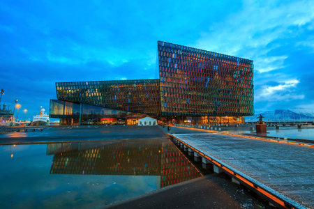REYKJAVIK, ICELAND - March 23: Twilight scene of Harpa Concert Hall in Reykjavik, Iceland on March 23, 2015. The Harpa Concert Hall is the new landmark of the city, build in 2011.のeditorial素材