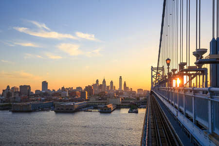 Panorama of Philadelphia skyline, Ben Franklin Bridge and Penn's Landing sunsetの写真素材