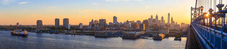 Panorama of Philadelphia skyline, Ben Franklin Bridge and Penn's Landing sunsetの写真素材