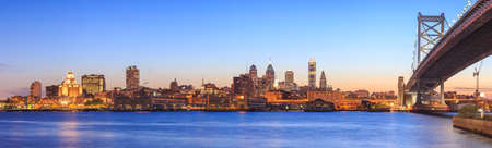 Panorama of Philadelphia skyline, Ben Franklin Bridge and Penn's Landing sunsetの写真素材