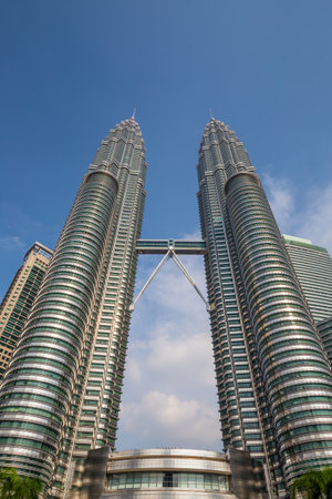 KUALA LUMPUR, MALAYSIA - June 25: Petronas Twin Towers on June 25, 2015 in Kuala Lumpur, Malaysia. Petronas Towers are twin skyscrapers and were tallest buildings in the world until 2004のeditorial素材