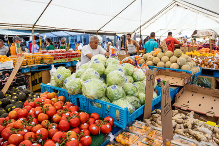 BOSTON - AUGUST 14: People shopping fruits at Haymarket on August 14, 2015 in Boston, Massachusetts,...
