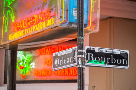 NEW ORLEANS, LOUISIANA - AUGUST 25: Bourbon street sign with Pubs and bars  in the French Quarter, downtown New Orleans on August 25, 2015.のeditorial素材