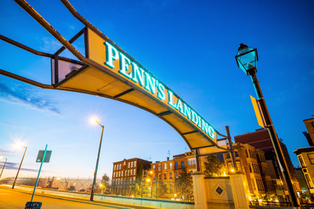 PHILADELPHIA - OCT 19: Penn's Landing and Market street in Philadelphia, Pennsylvania at twilight on October 19, 2015.のeditorial素材
