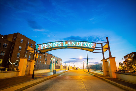 PHILADELPHIA - OCT 19: Penn's Landing and Market street in Philadelphia, Pennsylvania at twilight on October 19, 2015.のeditorial素材
