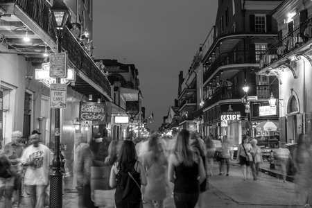 NEW ORLEANS, LOUISIANA - AUGUST 21: Pubs and bars with neon lights  in the French Quarter, downtown New Orleans on August 21, 2015.のeditorial素材