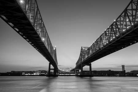 The Crescent City Connection Bridge on the Mississippi river in New Orleans Louisianaの写真素材