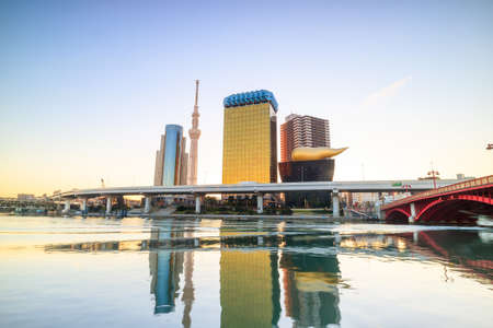 Tokyo skyline on the Sumida River at twilight.の写真素材