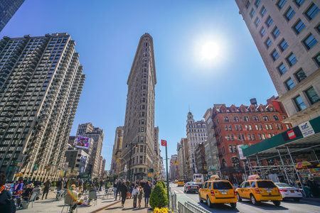 NEW YORK - APRIL 10: Historic Flatiron Building on Fifth Avenue on April 10, 2016 in Manhattan, New York, USAのeditorial素材