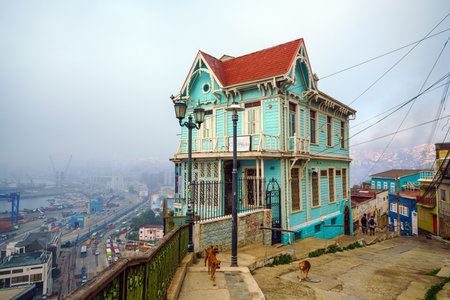 VALPARAISO, CHILE - May 15, 2016: Colourful street art decorating houses in the UNESCO World Heritage port city of Valparaiso in Chile.のeditorial素材