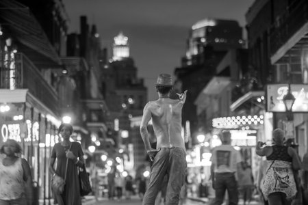 NEW ORLEANS, LOUISIANA - AUGUST 23: Pubs and bars with neon lights  in the French Quarter, downtown New Orleans on August 23, 2015.のeditorial素材