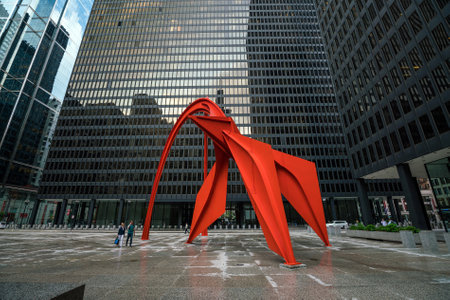 CHICAGO, IL - JUNE 22: Red Flamingo sculpture on June 22, 2016, created by artist Alexander Calder in 1973, located in the Federal Plaza in Chicago, Illinois, USのeditorial素材