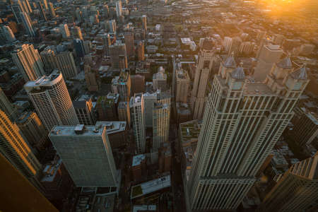 Aerial view of Chicago downtown skyline at sunset from high above.の写真素材