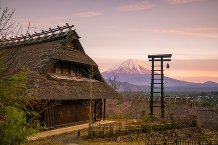 Old Japanese style house and Mt. Fuji  at sunset in Japanのeditorial素材