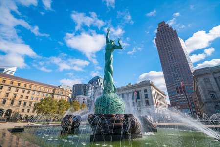 CLEVELAND, OH - NOVEMBER 4: Downtown Cleveland skyline and Fountain of Eternal Life Statue in Ohio USA on November 4, 2016のeditorial素材