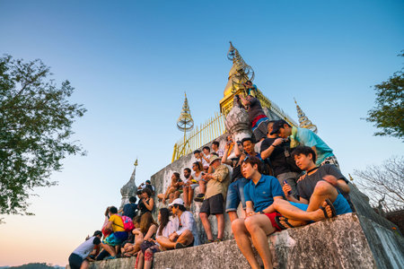LUANG PRABANG, LAOS - FEB 7: People waiting for sunset at Phou Si- Hill in Luang Prabang, Laos on Febuary 7, 2017のeditorial素材