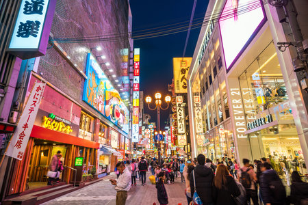 Osaka, Japan - APRIL 6 : Neon signs and billboard advertisements in  Dotonbori area in Osaka at twilight on April 6, 2017のeditorial素材