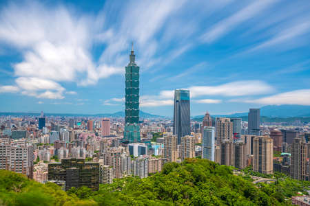 Skyline of downtown Taipei in Taiwan with blue skyの写真素材