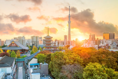 View of Tokyo skyline with Senso-ji Temple  at sunset in Japan.のeditorial素材