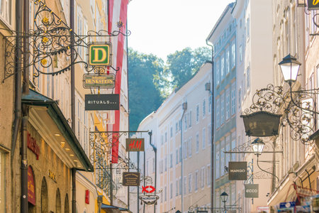 Salzburg, Austria - August 12, 2018:  Getreidegasse street - famous shopping street in Salzburg old town.のeditorial素材