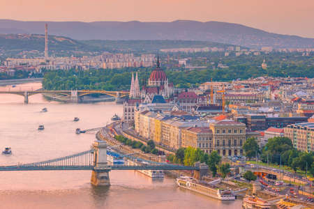 Budapest skyline in Hungary. Night view on Parliament building over delta of Danube riverの写真素材