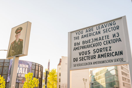 BERLIN, GERMANY : APRIL 19, 2019 : Checkpoint Charlie. The crossing point between East and west Berlin became a symbol of the Cold War in Berlin, Germanyのeditorial素材