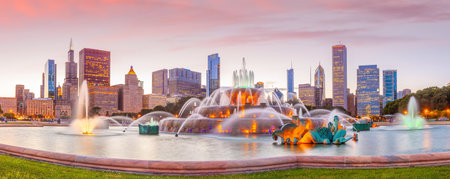 Panorama of Chicago skyline  with skyscrapers and Buckingham fountain at sunsetのeditorial素材