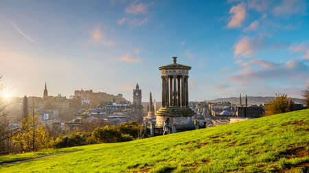 Old town Edinburgh city skyline. Cityscape in Scotland at sunsetの写真素材