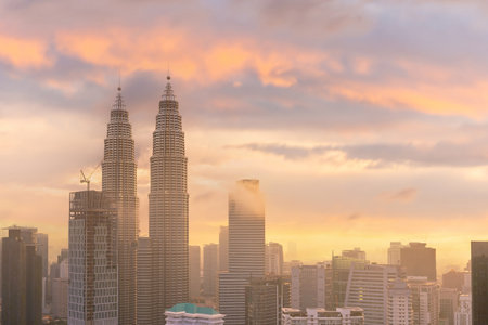 Downtown Kuala Lumpur city skyline cityscape of Malaysia at sunsetのeditorial素材