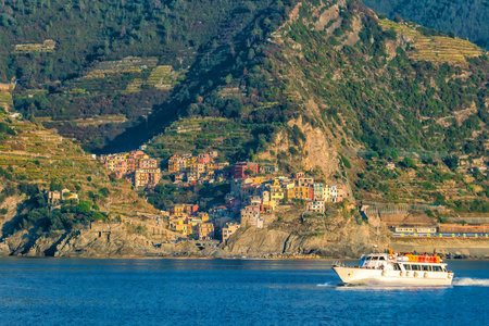 Manarola, Colorful cityscape on the mountains over Mediterranean sea in Cinque Terre Italy Europe