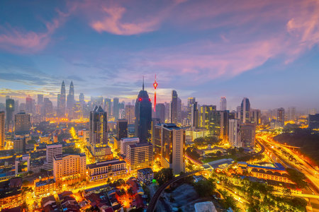 Downtown Kuala Lumpur city skyline cityscape of Malaysia at sunset
